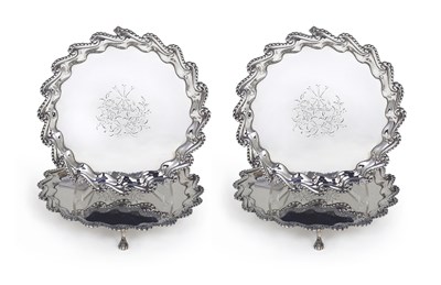 Lot 136 - A SET OF FOUR GEORGE III SILVER WAITERS