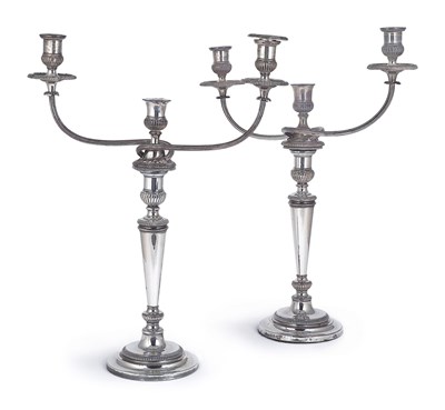 Lot 139 - A PAIR OF GEORGE III SHEFFIELD PLATE CANDELABRA