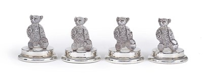 Lot 171 - A SET OF FOUR EDWARDIAN SILVER NOVELTY MENU HOLDERS