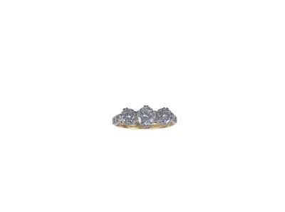 Lot 224 - A THREE STONE DIAMOND RING