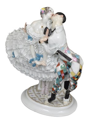 Lot 14 - A MEISSEN OUTSIDE DECORATED GROUP OF HARLEQUIN AND COLUMBINE FROM THE BALLETS RUSSES 'LE CARNIVAL'