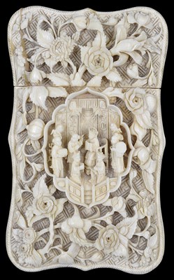 Lot 71 - ~A CHINESE CARVED IVORY CARD CASE AND COVER