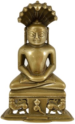 Lot 117 - A JAIN BRASS FIGURE OF PARSVANATHA