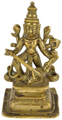 Lot 128 - A BRASS FIGURE OF DURGA SLAYING THE BUFFALO DEMON