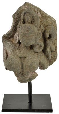 Lot 156 - A BUFF SANDSTONE FRAGMENT