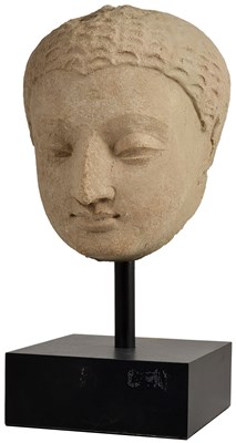 Lot 157 - A GANDHARA STUCCO HEAD OF BUDDHA