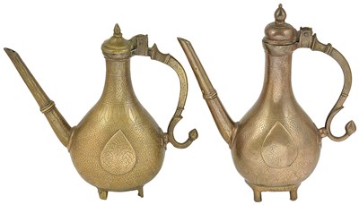 Lot 192 - TWO MUGHAL BRASS EWERS