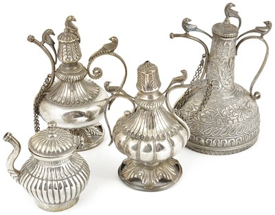 Lot 221 - FOUR SMALL SILVER EWERS