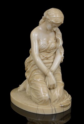 Lot 283 - ~AN IVORY FIGURE OF A SLAVE GIRL