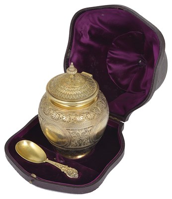 Lot 362 - A VICTORIAN SILVER-GILT TEA CADDY AND SPOON