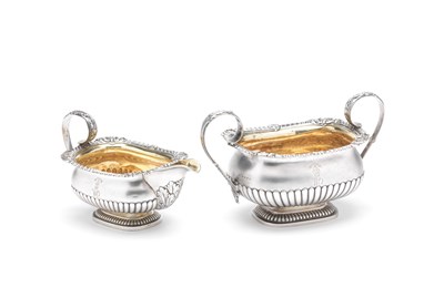 Lot 375 - A GEORGE III SILVER SUGAR BOWL AND MILK JUG SET