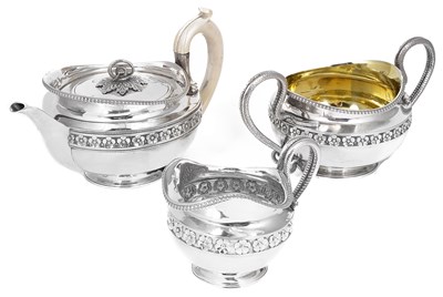 Lot 383 - ~A GEORGE III SILVER THREE-PIECE TEA SET