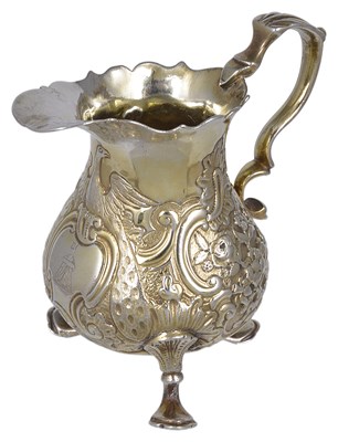 Lot 399 - A GEORGE II SILVER-GILT MILK JUG