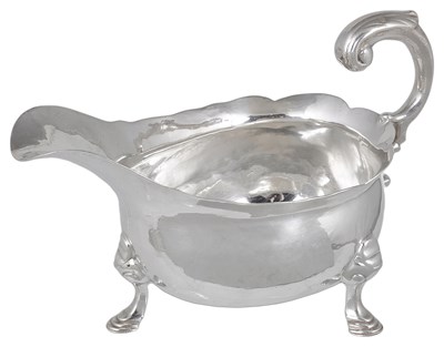 Lot 403 - A GEORGE II SILVER SAUCEBOAT