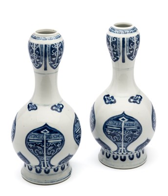 Lot 26 - A PAIR OF CHINESE BLUE AND WHITE ARCHAISTIC BOTTLE VASES, 19TH CENTURY