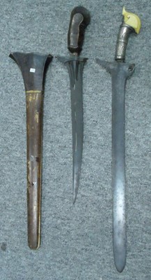 Lot 14 - ##AN IVORY-HILTED SHORTSWORD (KERIS) AND MORO SHORTSWORD (KERIS)