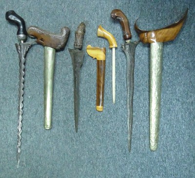 Lot 16 - FOUR SOUTHEAST ASIAN EDGED WEAPONS