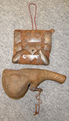 Lot 31 - A NORTH AFRICAN POWDER-FLASK AND POUCH