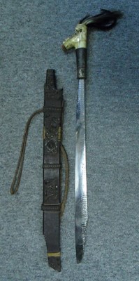 Lot 36 - A BORNEO HEAD HUNTERS SWORD (MANDAU)