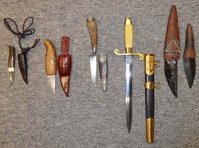 Lot 106 - A SMALL HUNTING KNIFE; TWO SMALL SCANDINAVIAN HUNTING KNIVES AND TWO ESKIMO KNIVES