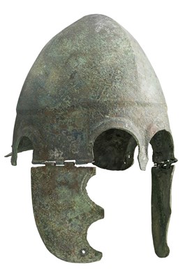 Lot 179 - A GREEK BRONZE HELMET OF CHALCIDIAN TYPE