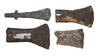 Lot 185 - ONE BRONZE AND THREE IRON AXE HEADS