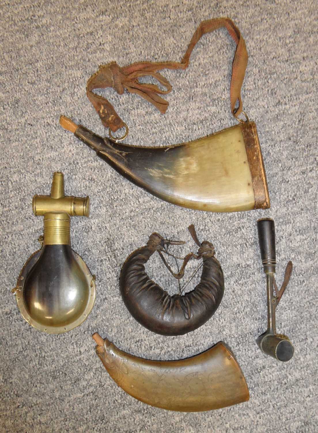 Lot 206 - THREE POWDER-FLASKS AND A POWDER MEASURE