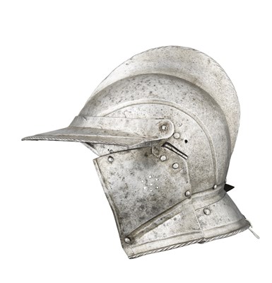 Lot 302 - A SOUTH GERMAN BURGONET WITH EMBOSSED DECORATION IN THE 'BLACK AND WHITE' FASHION