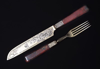 Lot 26 - A VICTORIAN SILVER-GILT AND RED AGATE CAKE KNIFE AND FORK