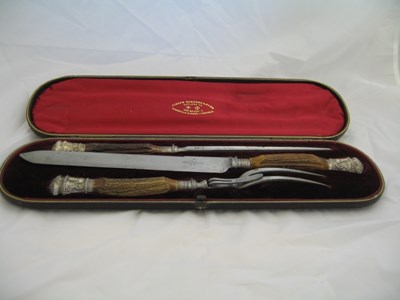 Lot 29 - A VICTORIAN SILVER-MOUNTED THREE-PIECE CARVING SET