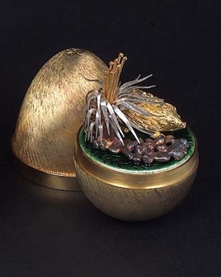 Lot 62 - A SILVER-GILT 'SURPRISE' EGG