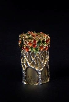 Lot 67 - A PARCEL-GILT-SILVER AND ENAMEL PILL BOX