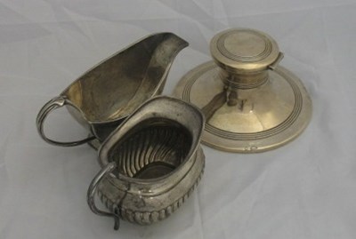 Lot 83 - A GEORGE V SILVER INKWELL