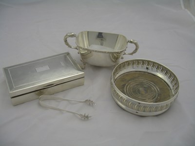 Lot 102 - A SILVER SUGAR BOWL AND PAIR OF SUGAR TONGS