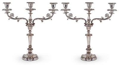 Lot 103 - A PAIR OF ELECTROPLATED SHEFFIELD PLATE THREE-LIGHT CANDELABRA