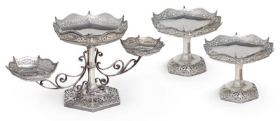 Lot 110 - AN EDWARDIAN SILVER THREE-PIECE TABLE GARNITURE