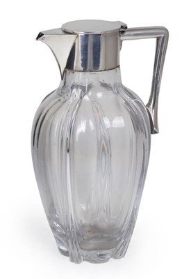 Lot 130 - A VICTORIAN SILVER-MOUNTED CLARET JUG IN THE MANNER OF DR CHRISTOPHER DRESSER