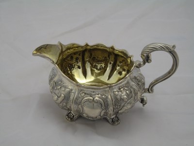 Lot 133 - A GEORGE IV SILVER MILK JUG