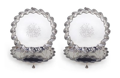 Lot 144 - A SET OF FOUR GEORGE III SILVER WAITERS