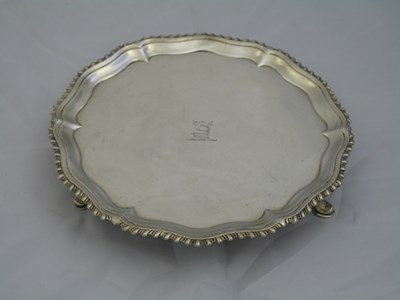 Lot 152 - A GEORGE III SILVER WAITER