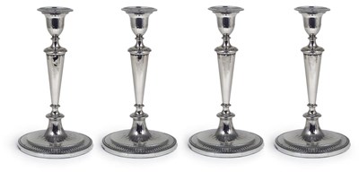 Lot 155 - A SET OF FOUR GEORGE III SILVER CANDLESTICKS