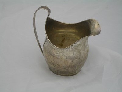 Lot 172 - A GEORGE III SILVER MILK JUG