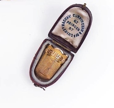 Lot 228 - A VICTORIAN GOLD THIMBLE