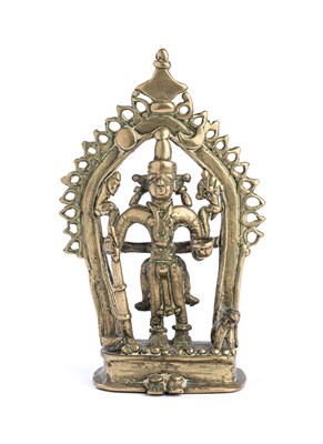 Lot 121 - A BRONZE FIGURE OF SIVA AS A WANDERING ASCETIC, WESTERN DECCAN, INDIA, CIRCA 19TH CENTURY