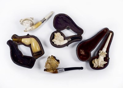 Lot 249 - A COLLECTION OF FOUR MEERSCHAUM CHEROOT HOLDERS AND A MEERSCHAUM PIPE