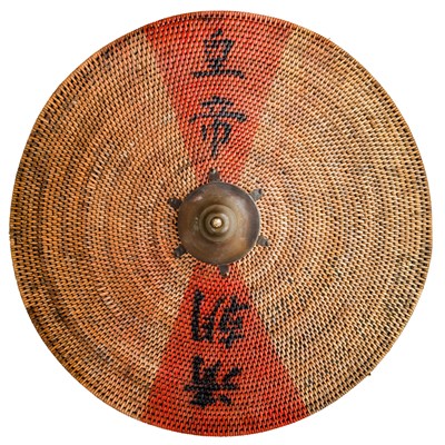 Lot 32 - A LARGE CHINESE CIRCULAR CANE SHIELD