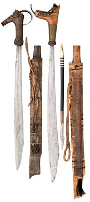 Lot 54 - TWO DYAK HEAD HUNTER'S SWORDS (MANDAU)