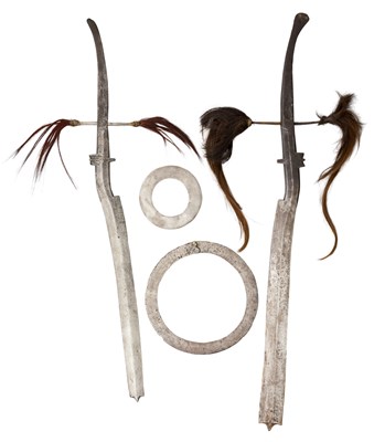 Lot 61 - TWO INDIAN SWORDS (GARO DAO) AND TWO INDIAN THROWING QUOITS