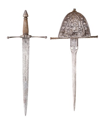 Lot 348 - TWO LEFT HAND DAGGERS IN 17TH CENTURY STYLE