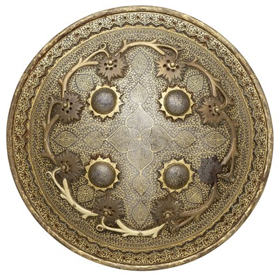 Lot 32 - **AN INDIAN DECORATED SHIELD (DHAL)